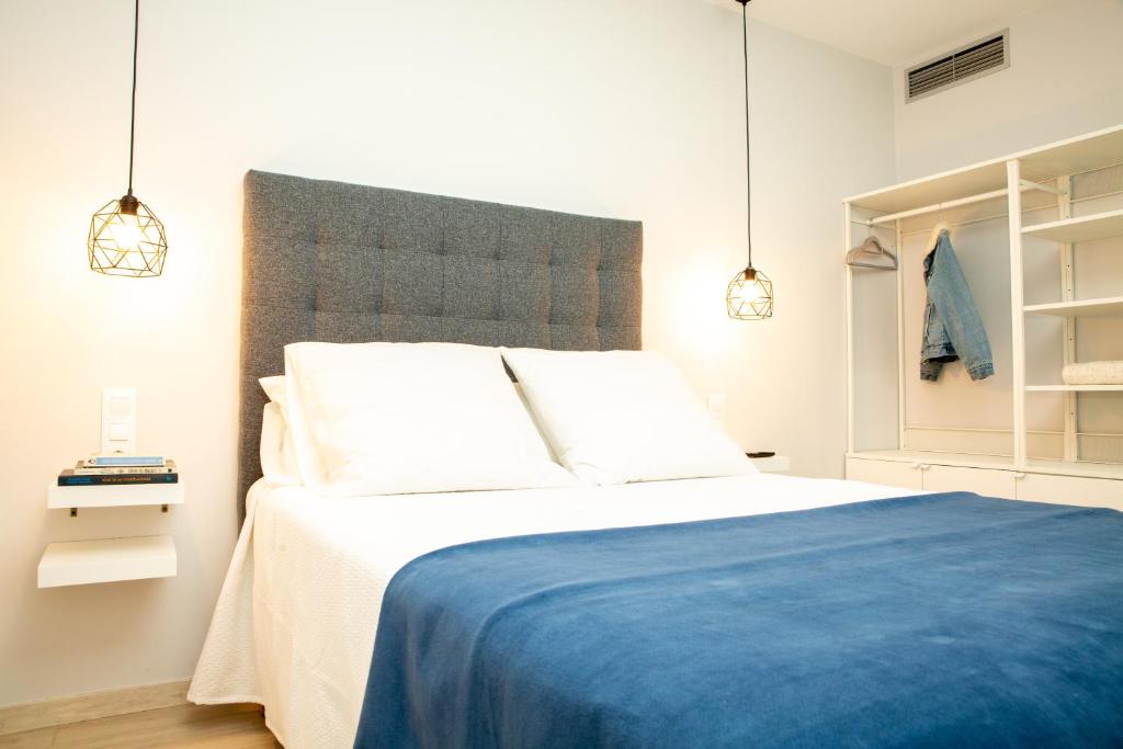 A bed or beds in a room at O Legado de Ramira