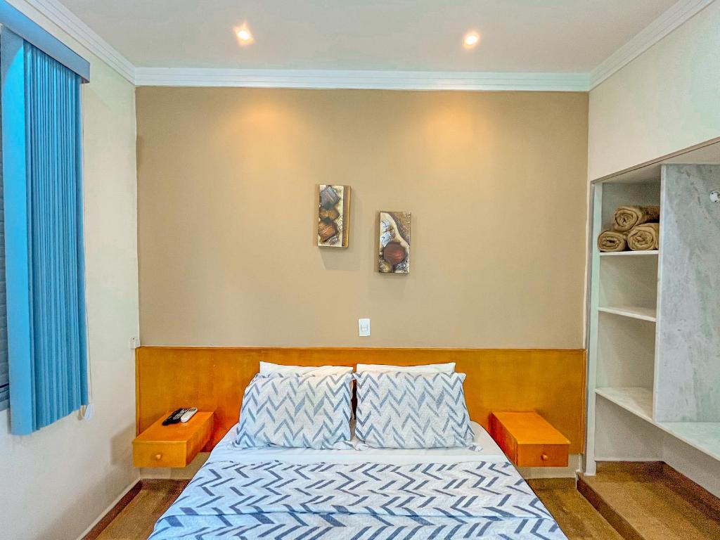 Krevet ili kreveti u jedinici u objektu Hotel Nacional Inn Guarujá