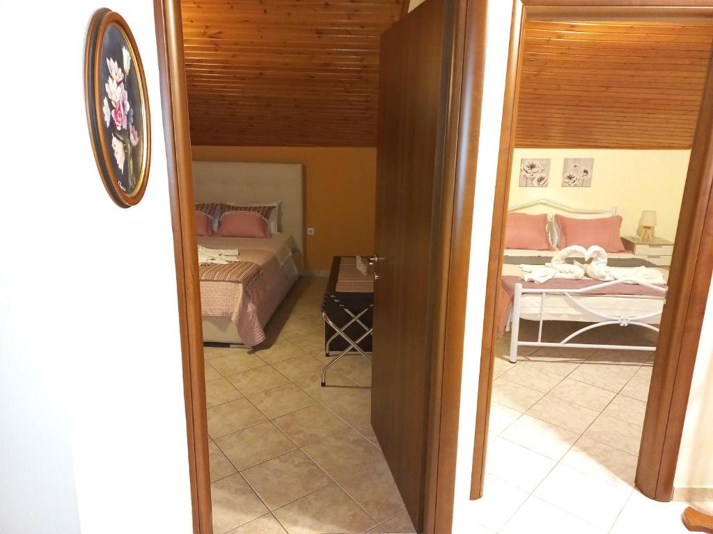 Posteľ alebo postele v izbe v ubytovaní Sofita view Kavala