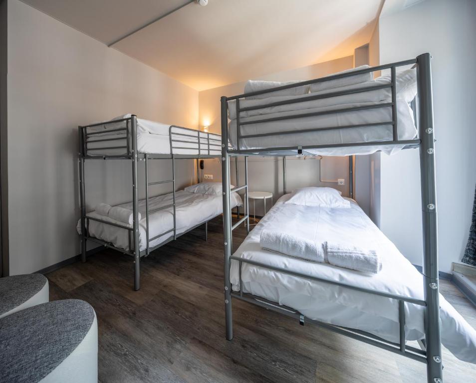 Postel nebo postele na pokoji v ubytování Hotel Bristol