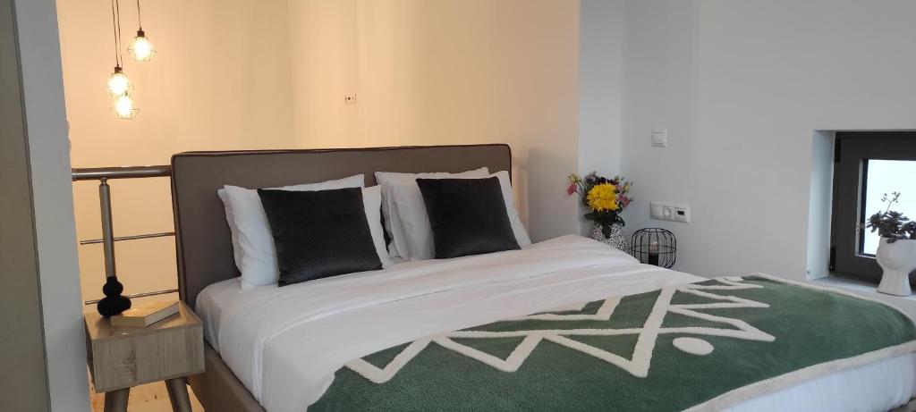 EZITH LUXURY APARTMENTSにあるベッド