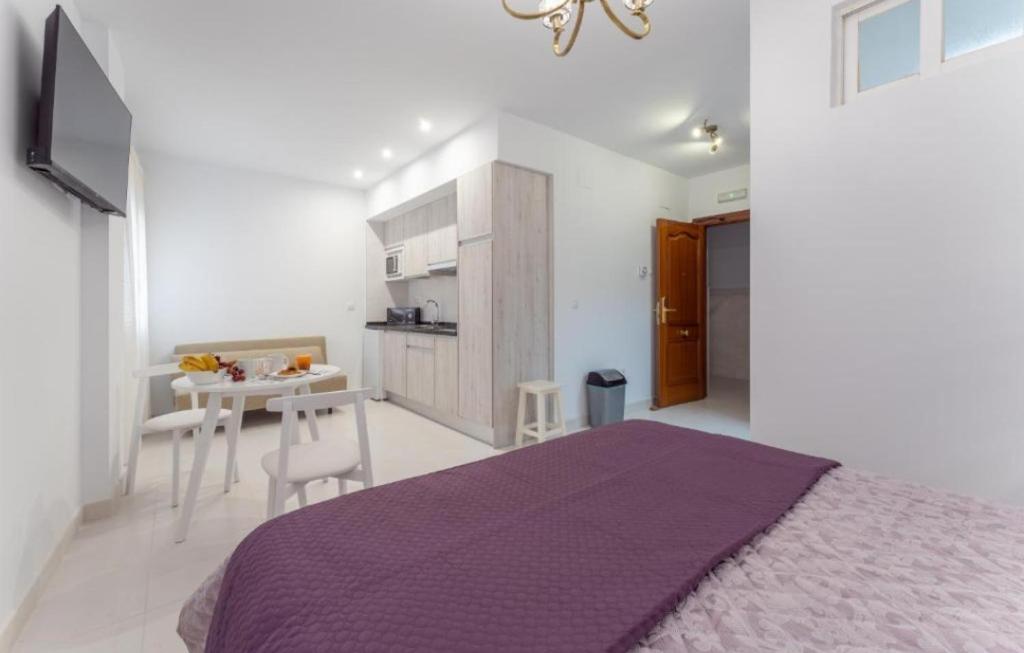 Televízia a/alebo spoločenská miestnosť v ubytovaní Villa Augusto Cosy Romance