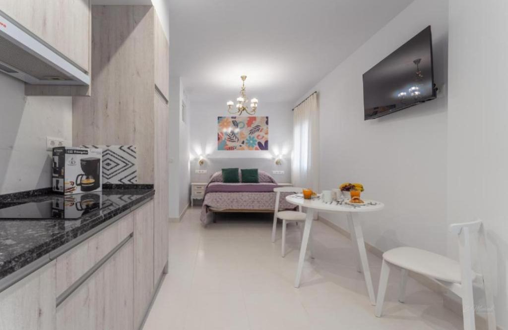 Kuchyňa alebo kuchynka v ubytovaní Villa Augusto Cosy Romance