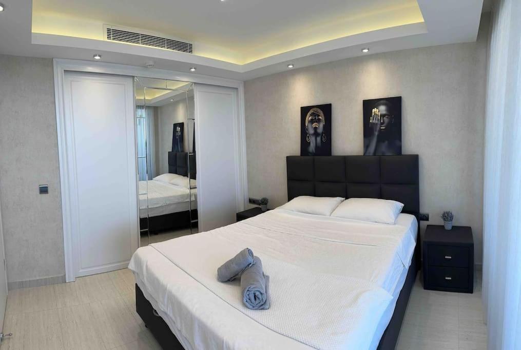 Postel nebo postele na pokoji v ubytování Апартаменты в Elite Admiral