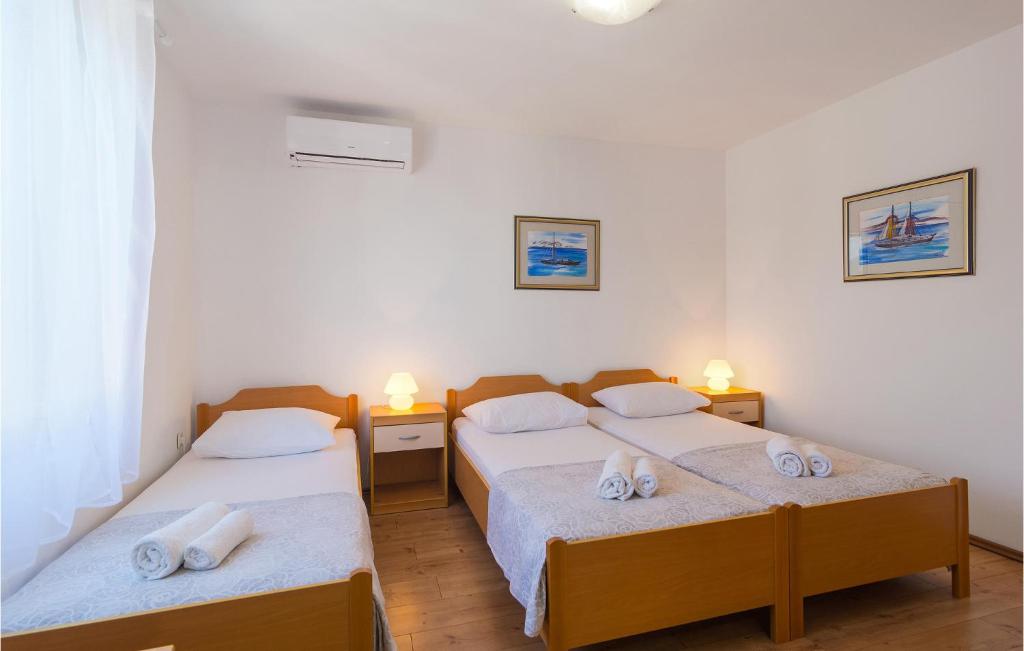 Posteľ alebo postele v izbe v ubytovaní Two-Bedroom Holiday Home In Zastrazisce