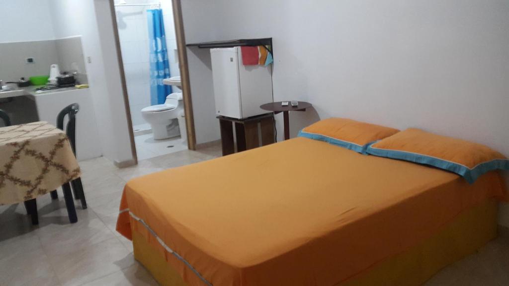 Cama o camas de una habitación en Posada Villa Mayo Habitación Matrimonial Equipada