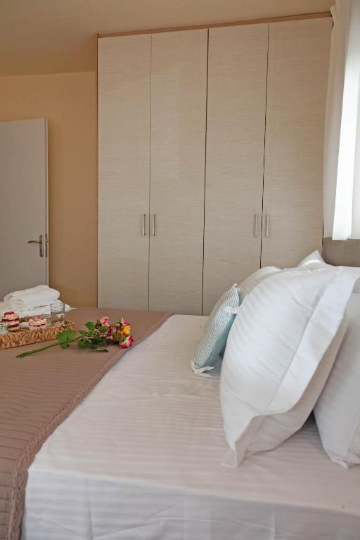 Postel nebo postele na pokoji v ubytování Villa Alex