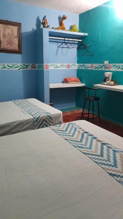 Postel nebo postele na pokoji v ubytování Casa Atrapasueños