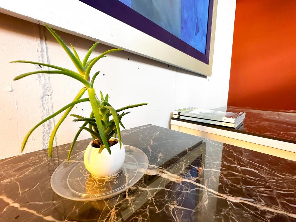 TV a/nebo společenská místnost v ubytování Hotel Arena Suites Movistar Arena