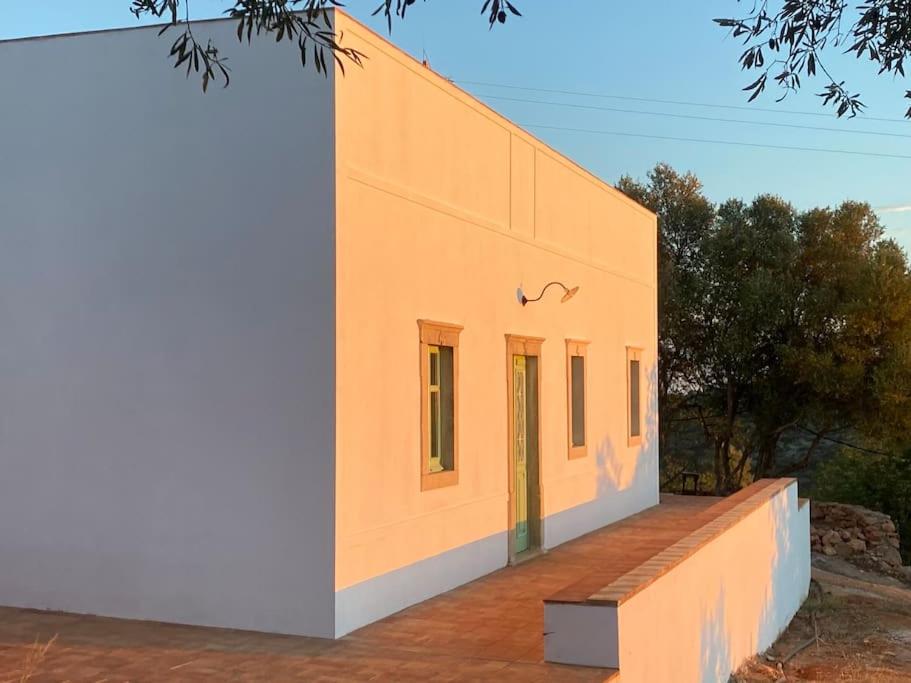 a building with a ramp on the side of it at Eco-Villa Monte Do Barrocalinho in Loulé