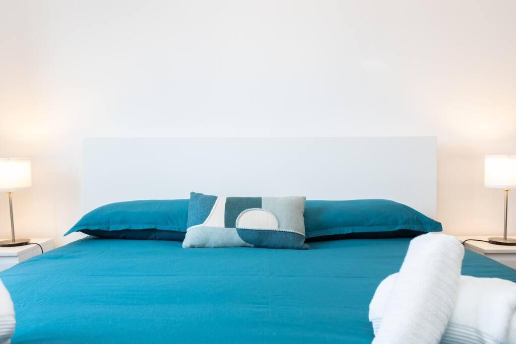 Postel nebo postele na pokoji v ubytování Casa conde - Blue coast