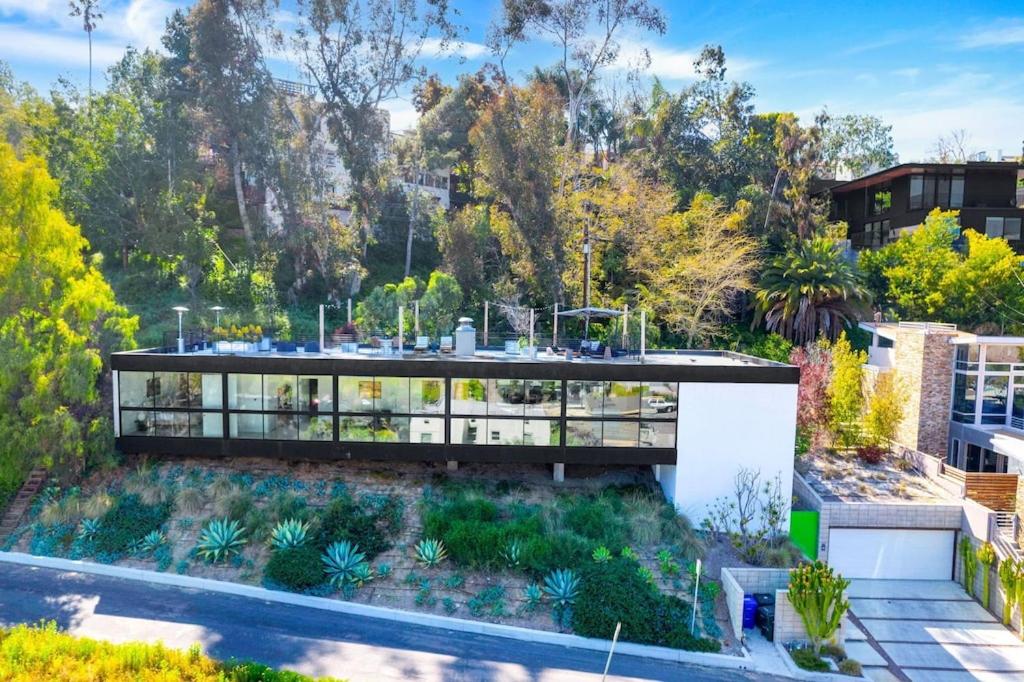 an aerial view of a house with a garden at Experience Eco-Luxury at its Finest - Centrally Located Clea House in San Diego! in San Diego