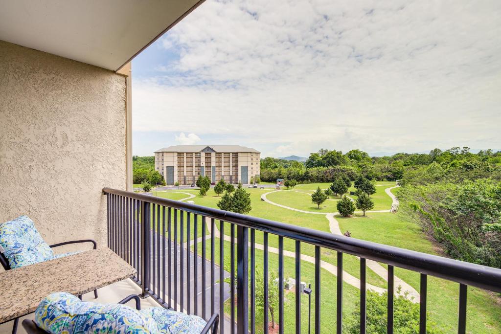 a balcony with a view of a building at Pigeon Forge Condo with Community Amenities! in Pigeon Forge