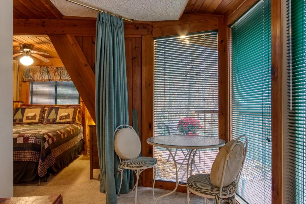 Mountain Springs Chalet- A Romantic Smoky Mountain Escape - Private Original A-Frame Chalet - access to Buckberry Creek, Mature Hardwood Forest, very close to Ober Gatlinburg, the Great Smoky Mountains National Park, and Downtown Gatlinburg in the Smokies photo