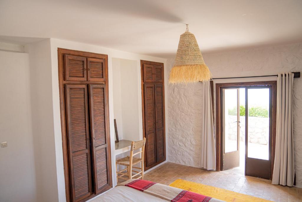 Postel nebo postele na pokoji v ubytování Dar El Mandar - Ferme & Table d'Hôte Berbère
