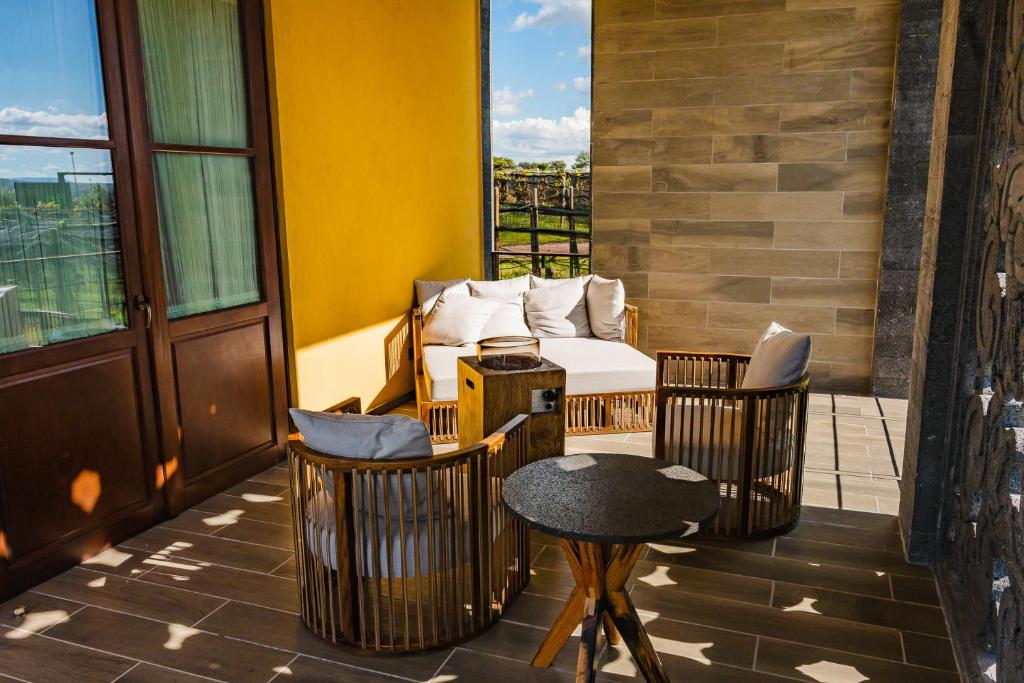 Posezení v ubytování Casa Raíces Hotel Luxury & Viñedo