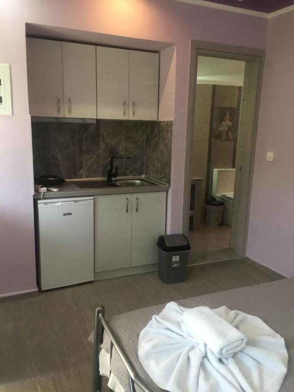 Kuchyň nebo kuchyňský kout v ubytování Katrine Seaside Rooms #PROPERTLY