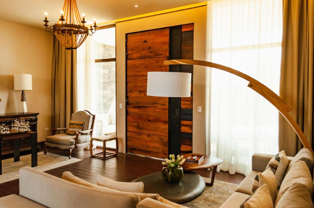 Posezení v ubytování Casa Raíces Hotel Luxury & Viñedo