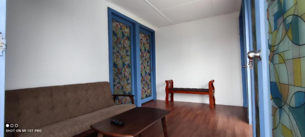 Posezení v ubytování D' Limbai Cottage
