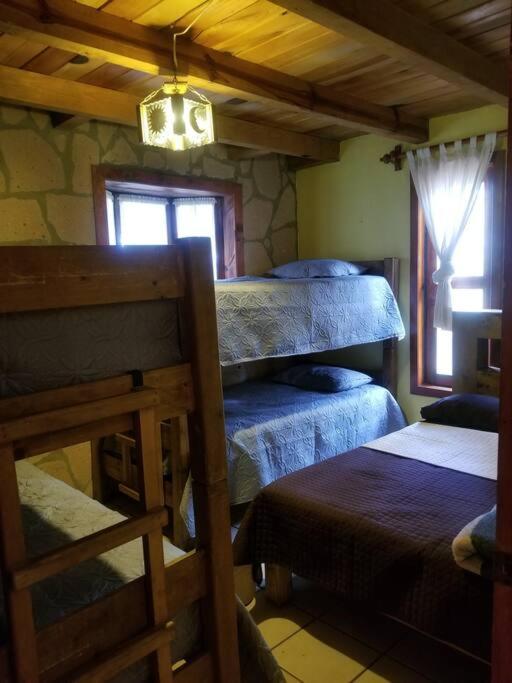 Postel nebo postele na pokoji v ubytování Cabaña rustica a 1km de cascada