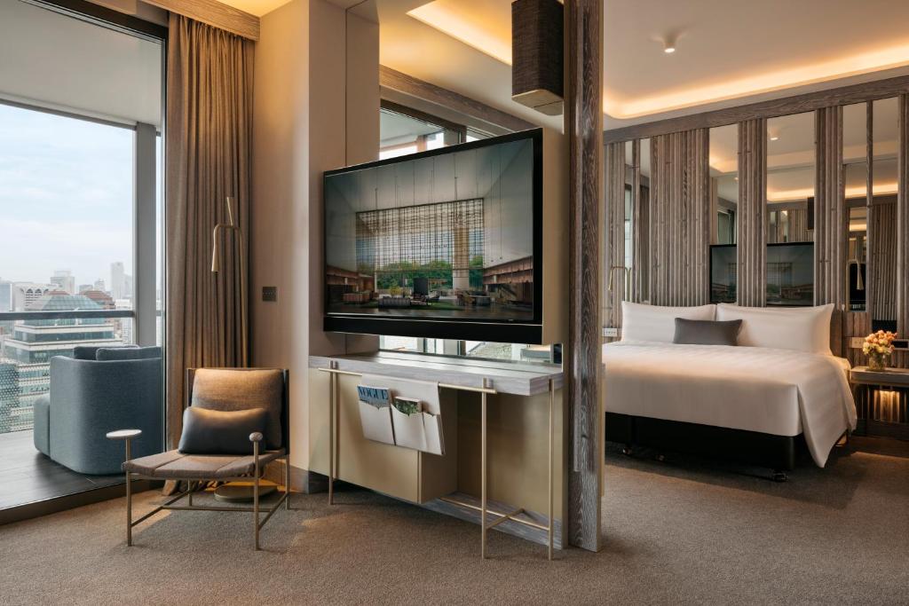 Giường trong phòng chung tại Pan Pacific Orchard