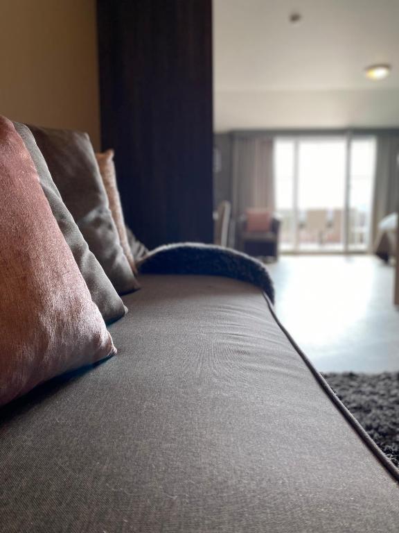 Postel nebo postele na pokoji v ubytování Charmehotel Kruishof
