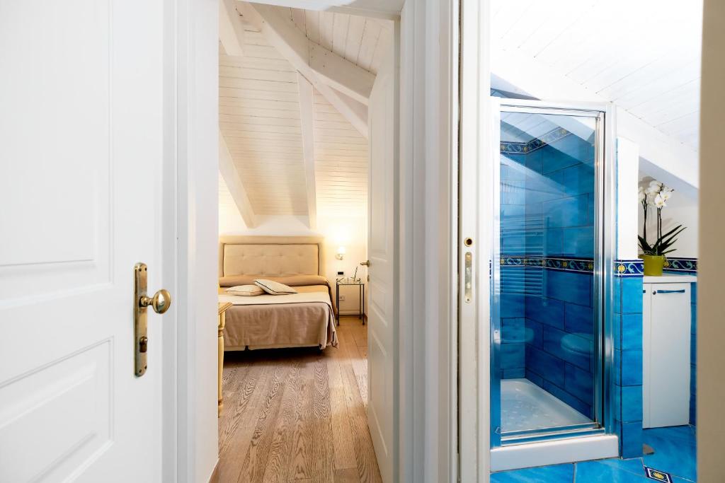 Letto o letti in una camera di Villa Fabiana