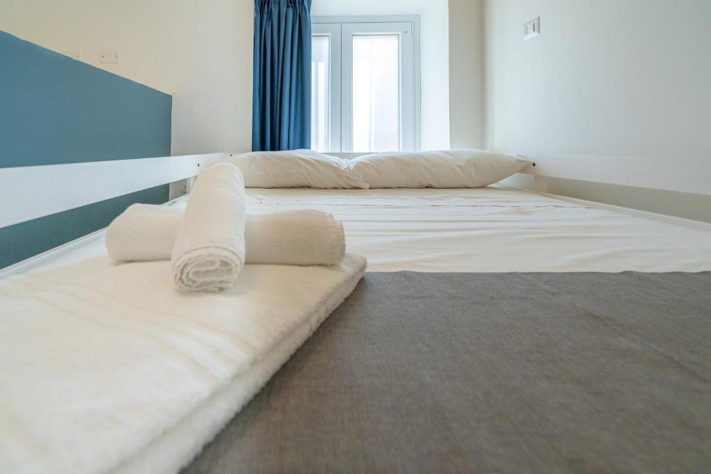 Postel nebo postele na pokoji v ubytování Casa Danieli