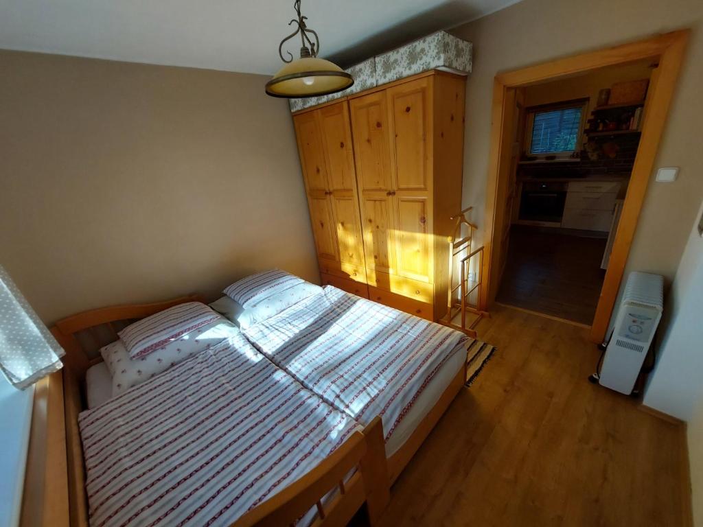 Postel nebo postele na pokoji v ubytování Chata Jakub - Červená Veža