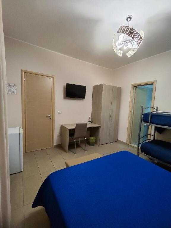 Postel nebo postele na pokoji v ubytování Albergo Primavera