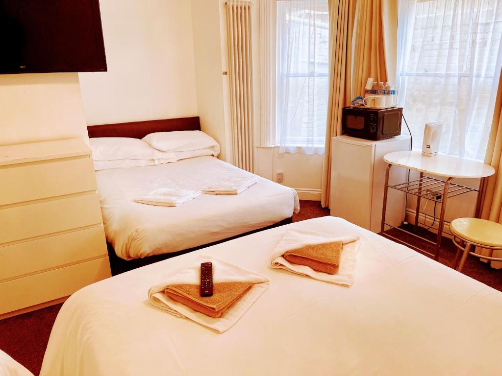 Postel nebo postele na pokoji v ubytování St George Hotel Great Yarmouth