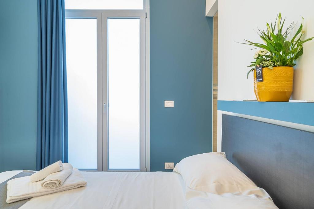 Postel nebo postele na pokoji v ubytování Casa Danieli