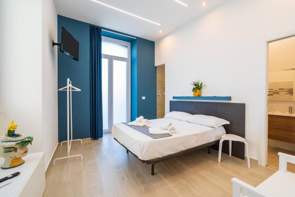 Postel nebo postele na pokoji v ubytování Casa Danieli