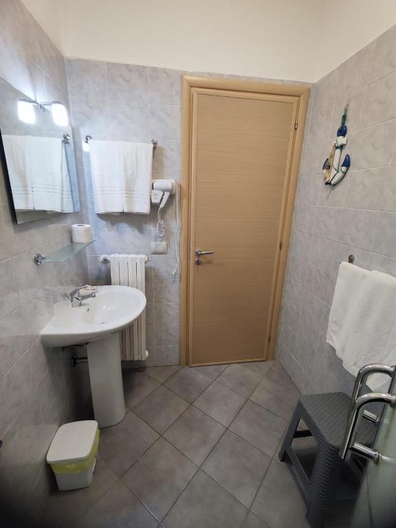 Koupelna v ubytování Albergo Primavera