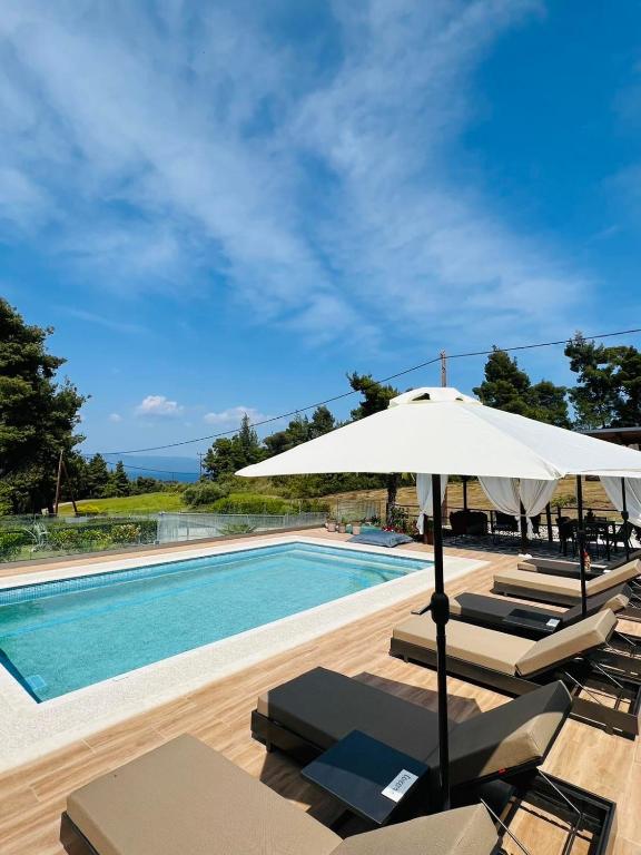 The swimming pool at or close to Eden apartments Paliouri- Concordia apartment