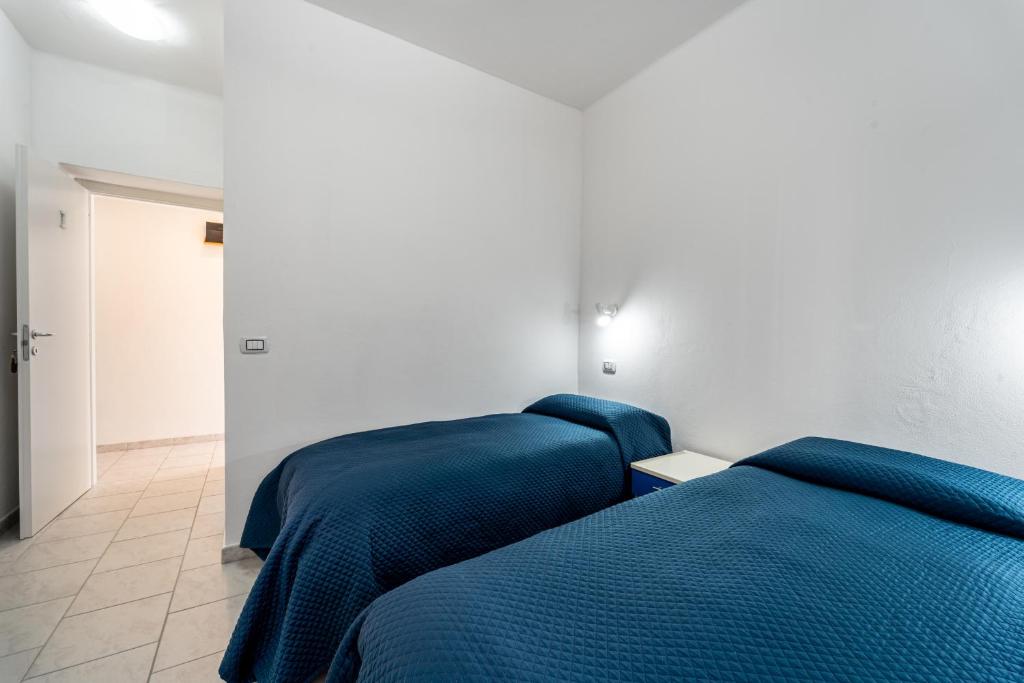 Postel nebo postele na pokoji v ubytování B&B il Rifugio