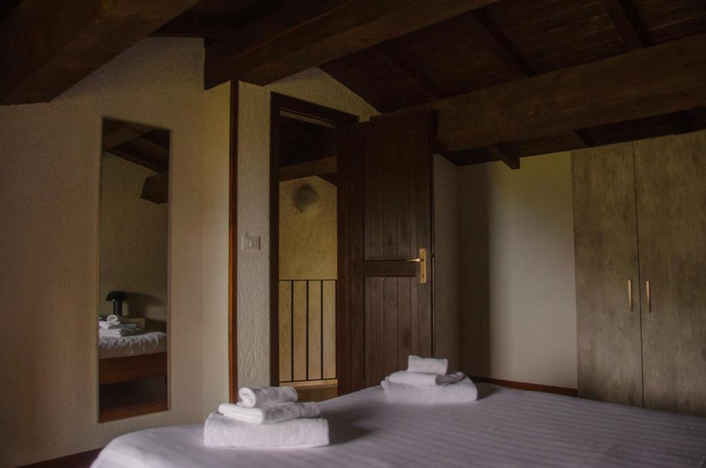 Postel nebo postele na pokoji v ubytování Residence San Michele