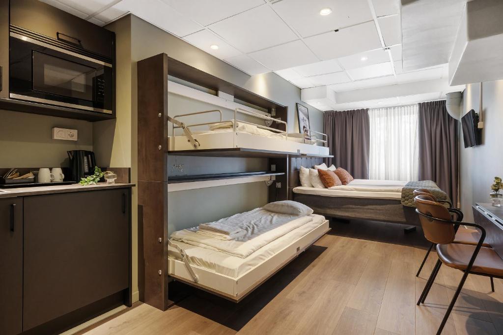 Postel nebo postele na pokoji v ubytování Hotel Point