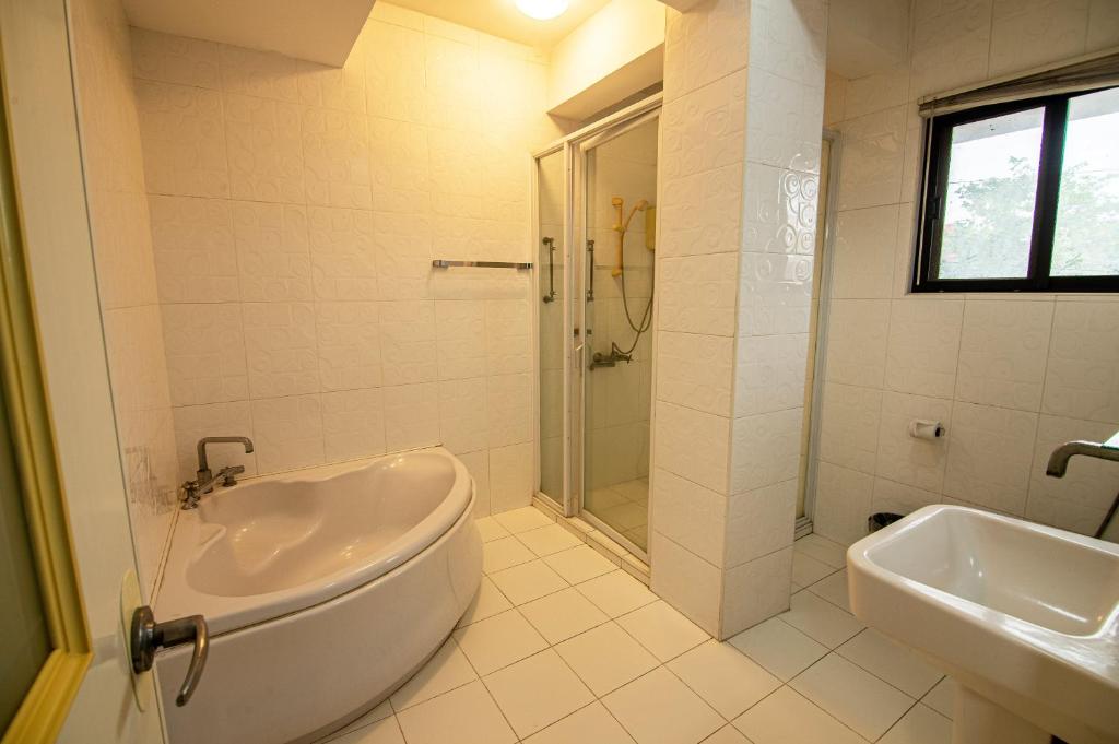Koupelna v ubytování Kiwi Hotel