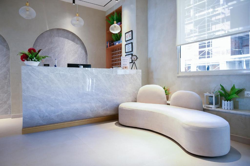 Uma cama ou camas num quarto em Hotel Zanzi