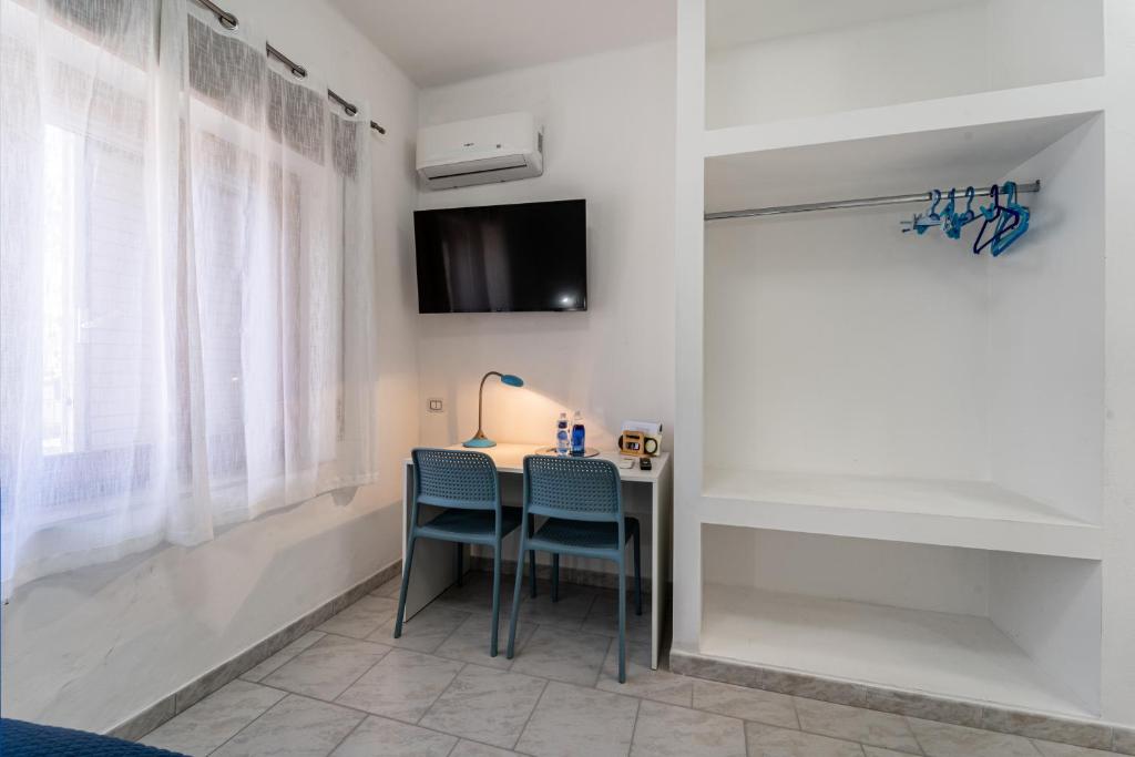 TV a/nebo společenská místnost v ubytování B&B il Rifugio