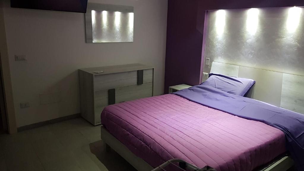 Postel nebo postele na pokoji v ubytování CASA DAVID