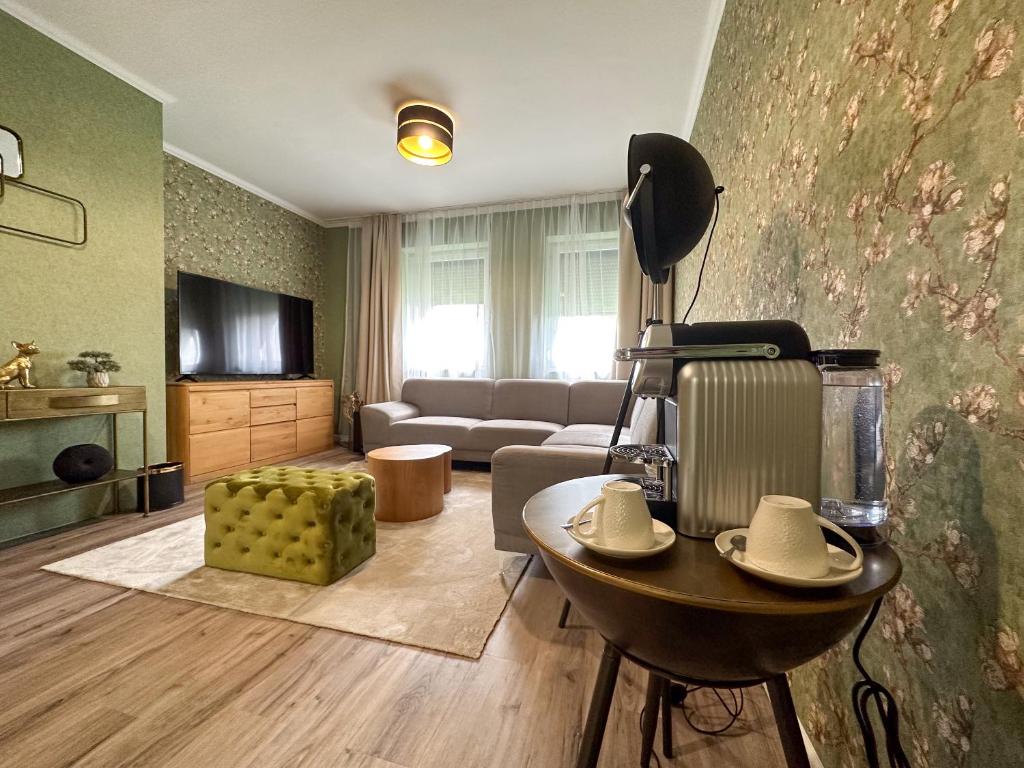 TV a/nebo společenská místnost v ubytování MILIA wine & event resort