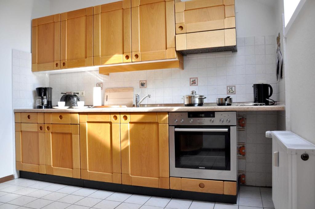 Kuchyň nebo kuchyňský kout v ubytování Ferienwohnung Sperlingslust