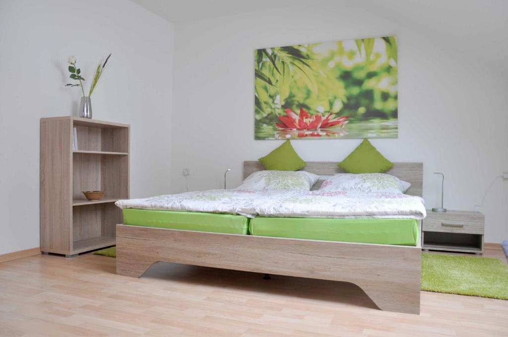 Postel nebo postele na pokoji v ubytování Ferienwohnung Sperlingslust