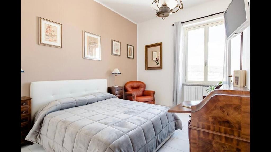 Postel nebo postele na pokoji v ubytování B&B Maison Rosetta IUN-E4948