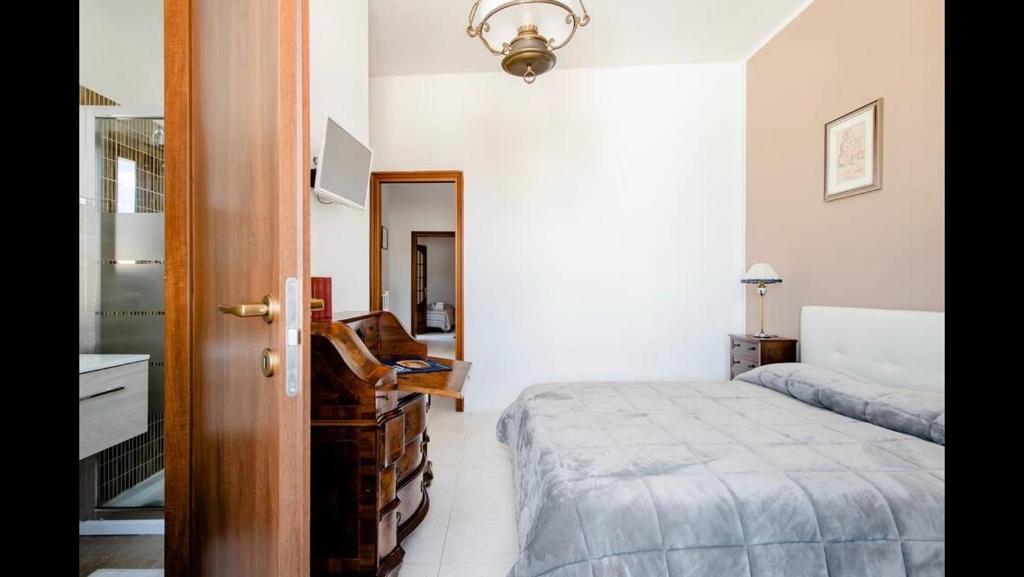 Postel nebo postele na pokoji v ubytování B&B Maison Rosetta IUN-E4948