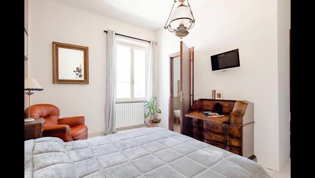 Postel nebo postele na pokoji v ubytování B&B Maison Rosetta IUN-E4948
