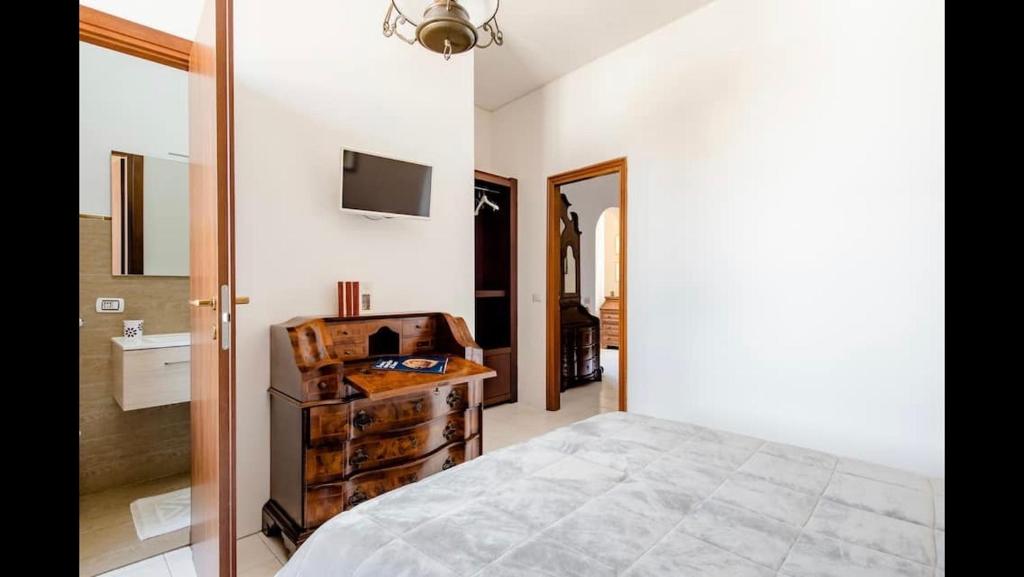 Postel nebo postele na pokoji v ubytování B&B Maison Rosetta IUN-E4948