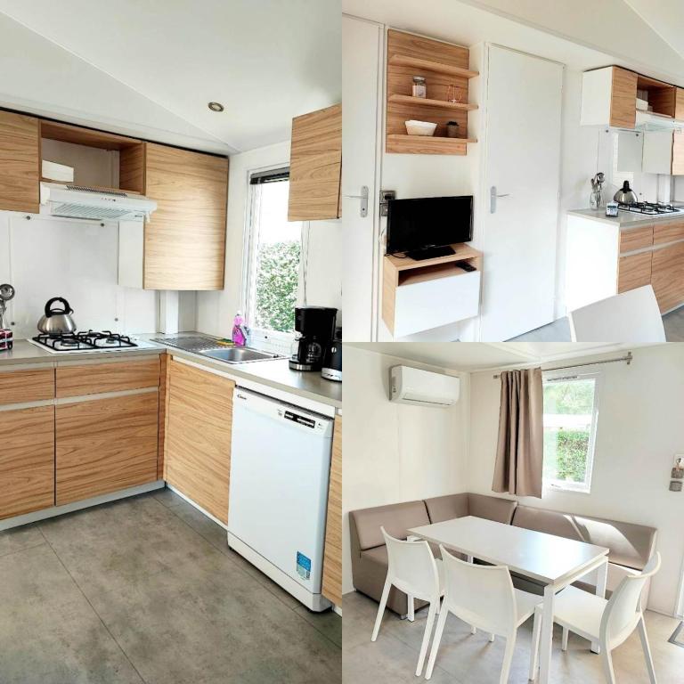a kitchen with wooden cabinets and a table with chairs at Mobil-home in Biscarrosse
